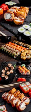 Sushi and rolls with sauce on the table Japanese cuisine