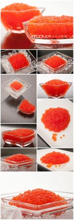 Red caviar in a transparent plate stock photo