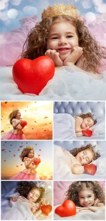 Girl with curly hair holding a red heart