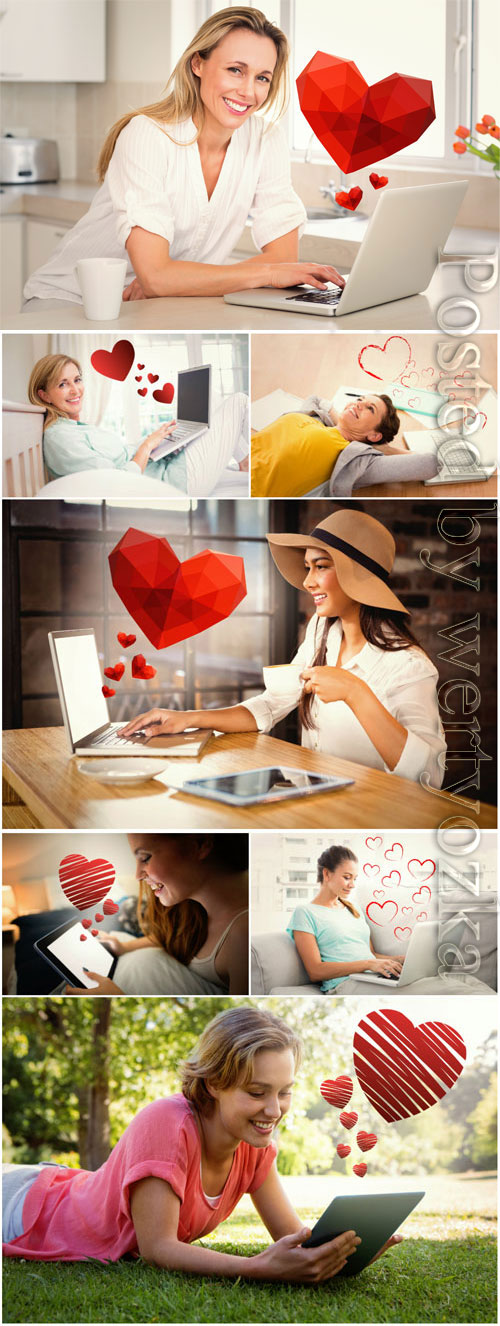 Smiling women with laptops stock photo